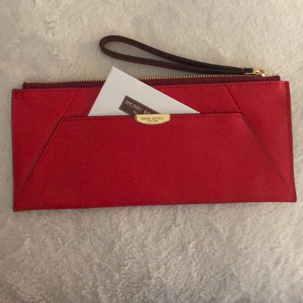 New, never used HENRI BENDEL clutch.